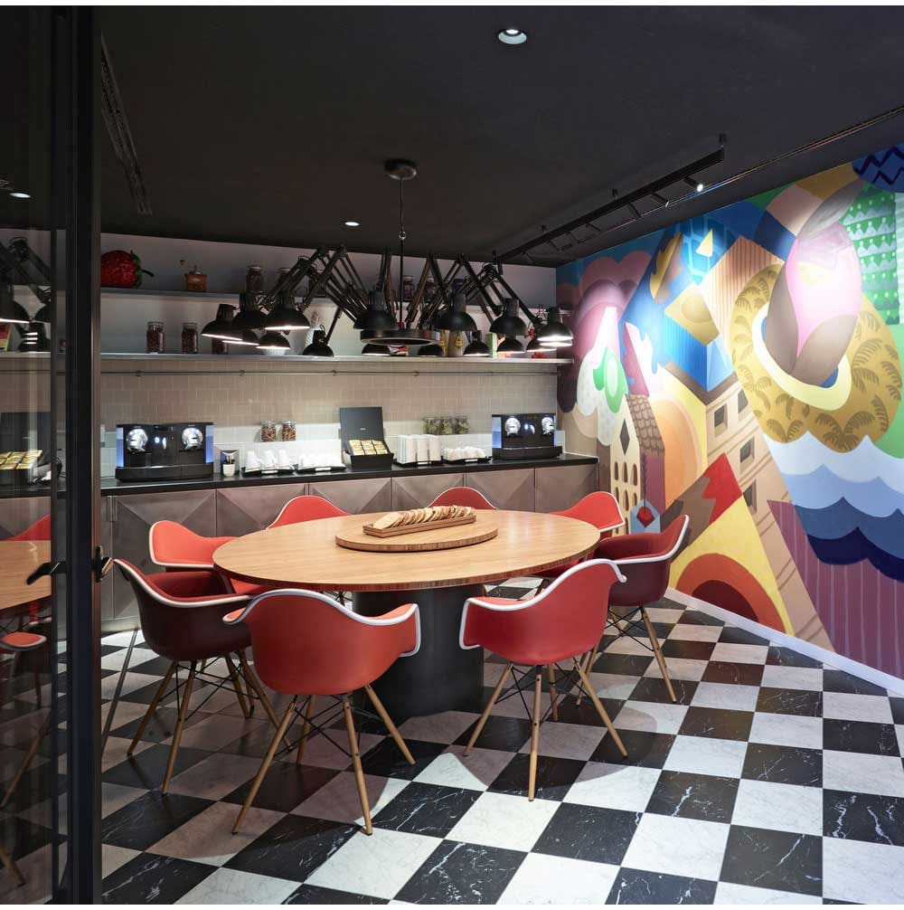 Eames Plastic Armchair RE DAW mit Sitzpolster